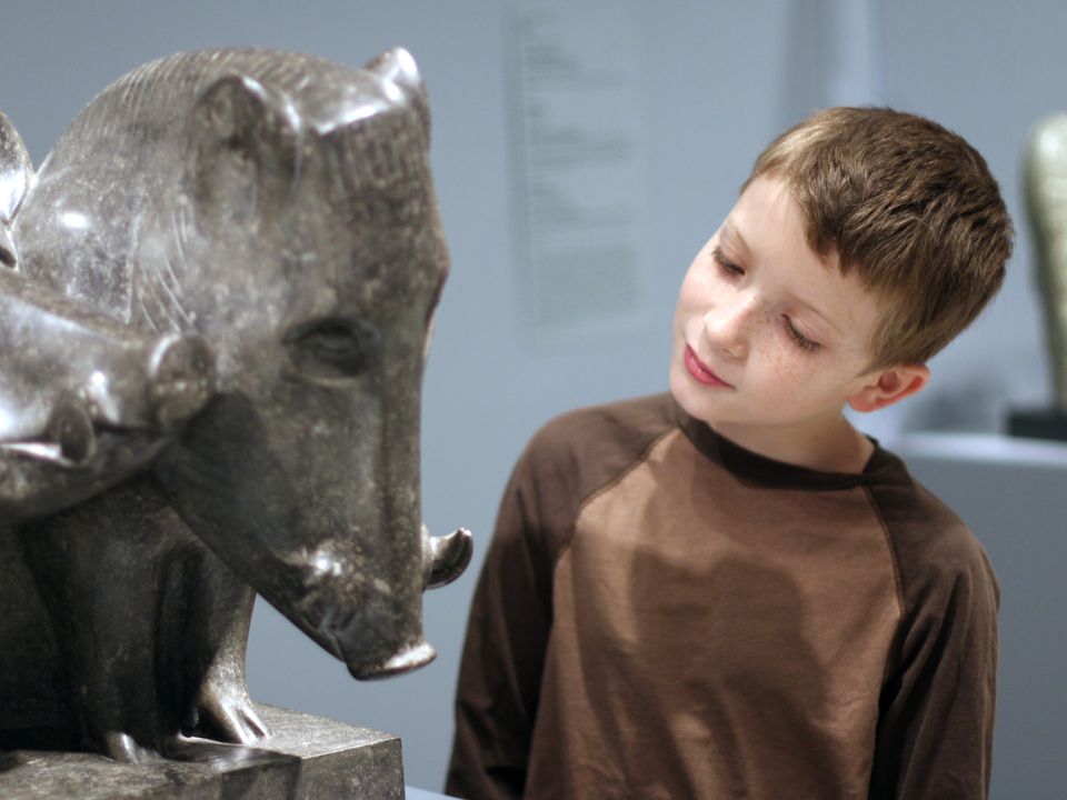 This is a picture of a student looking at a sculpture at the Smithsonian American Art Museum 