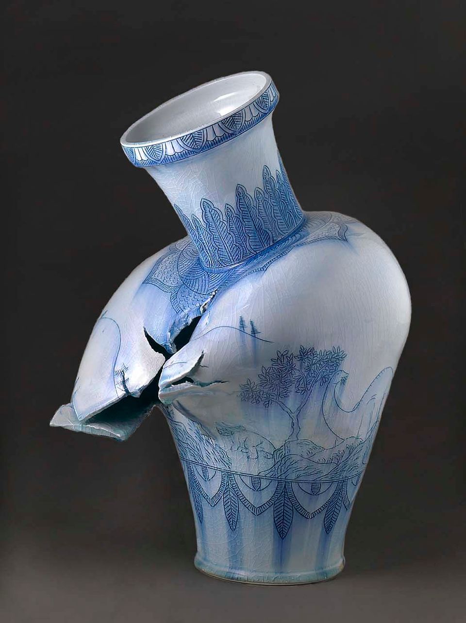 This image shows a vase that appears to have broken from the inside by artist Steven Young Lee
