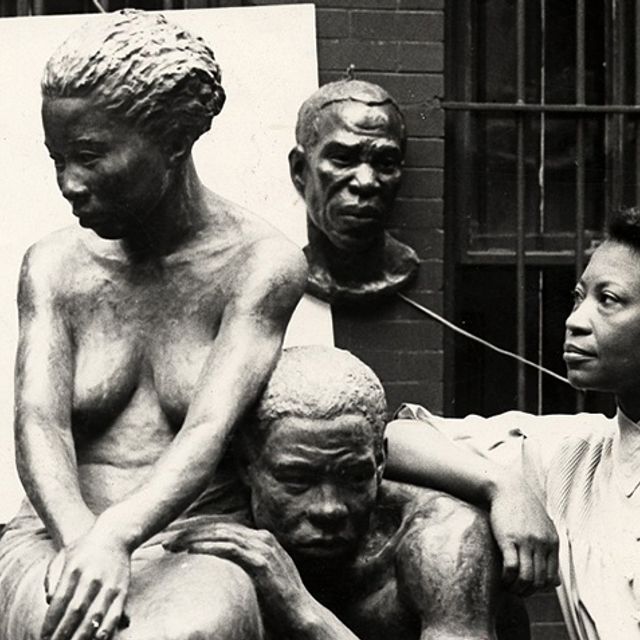 Artist Augusta Savage with her sculpture