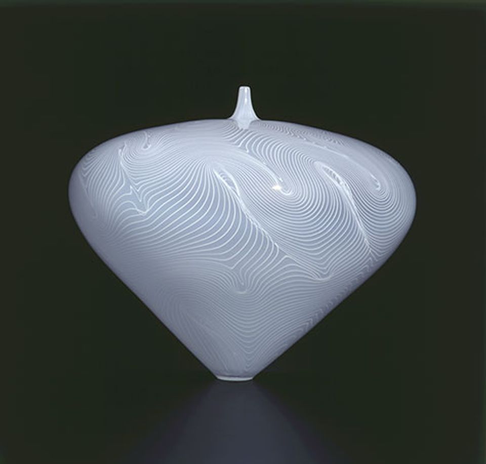 A white glass vessel.