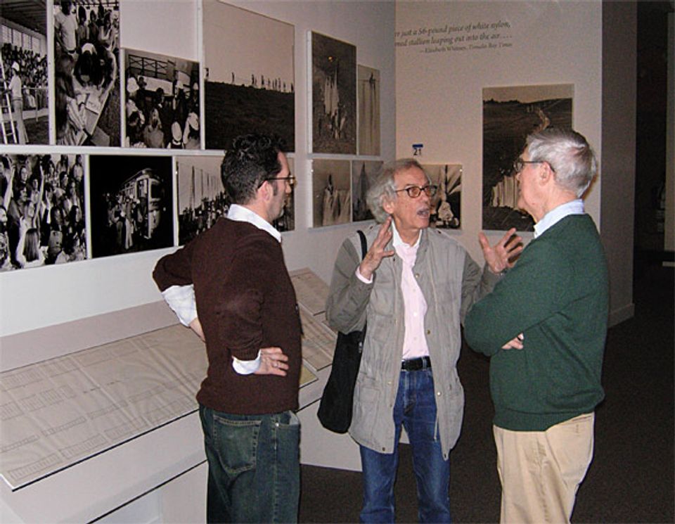 Christo speaking with museum staff