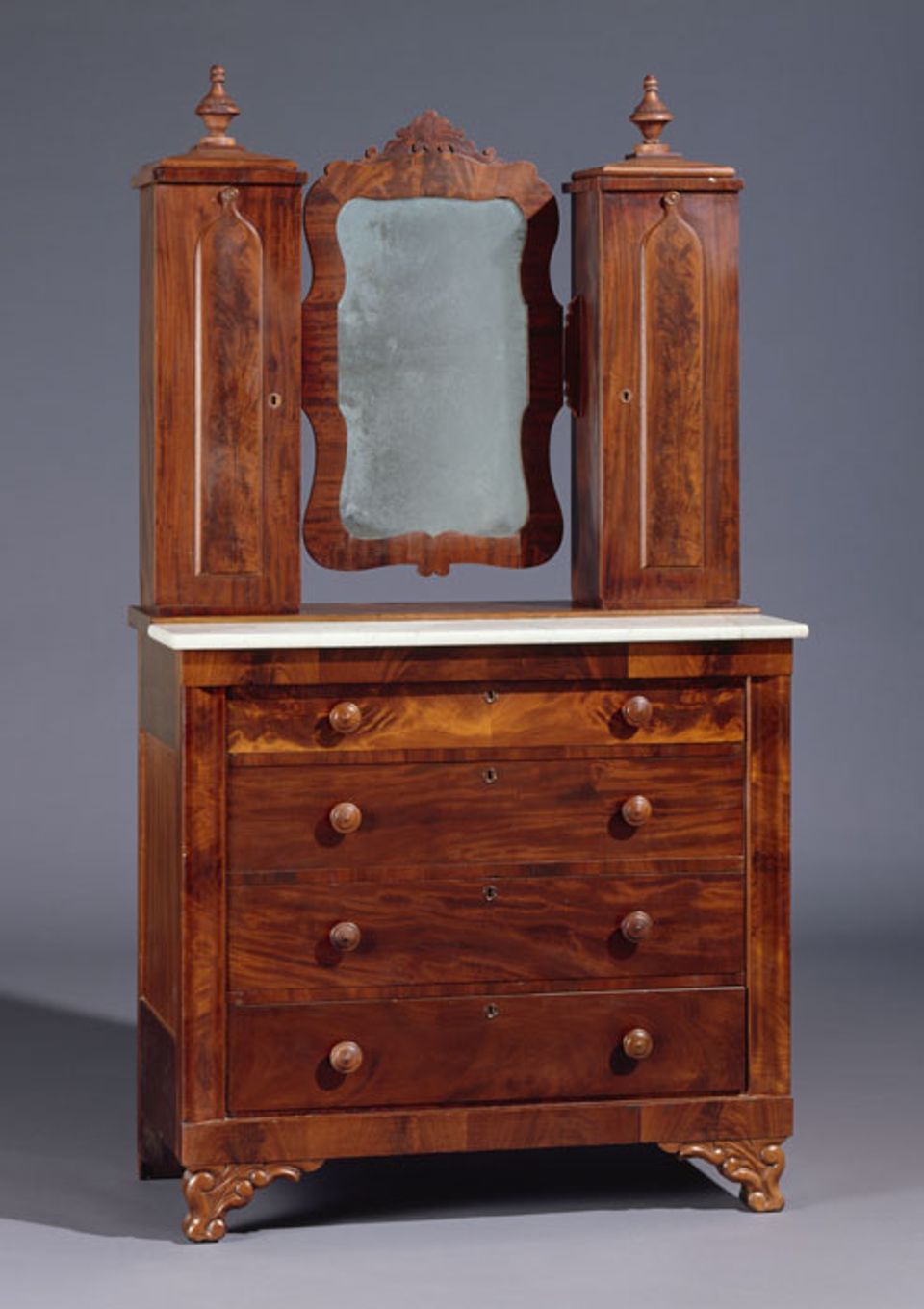 A mahogany Grecian style bureau.