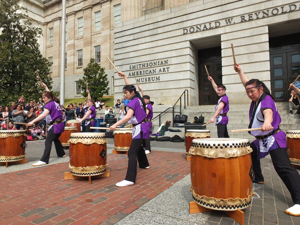 Taiko drummers perform on SAAM's plaza.