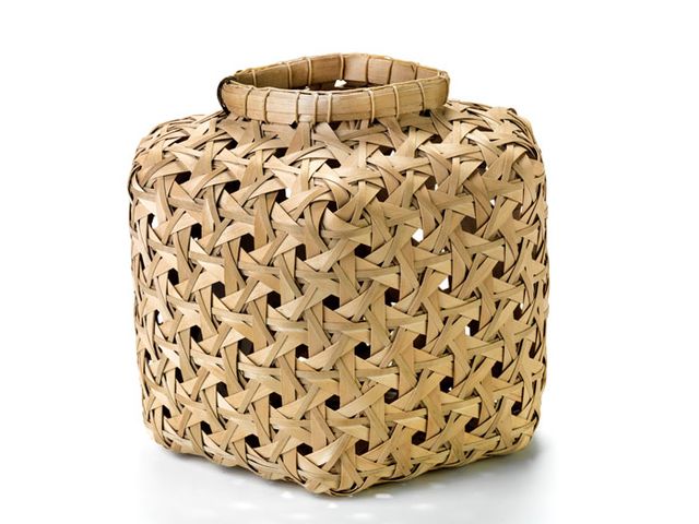 This is a basket with a square shaped appearance. 