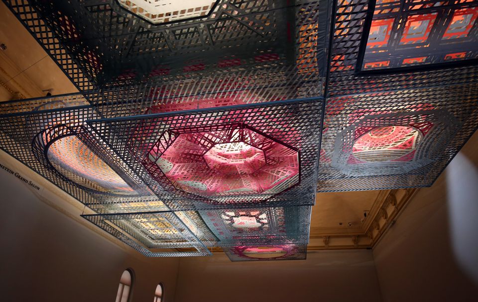 A photograph of the installation Parallax Gap hanging from the Grand Salon ceiling at the Renwick Gallery