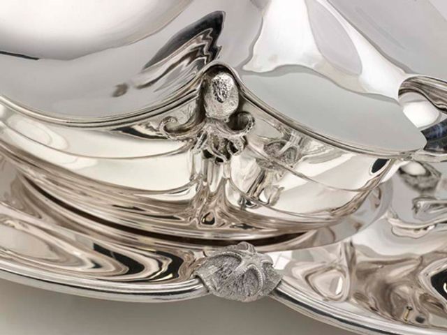 A photo showing a detail of Vitali's silver tureen.
