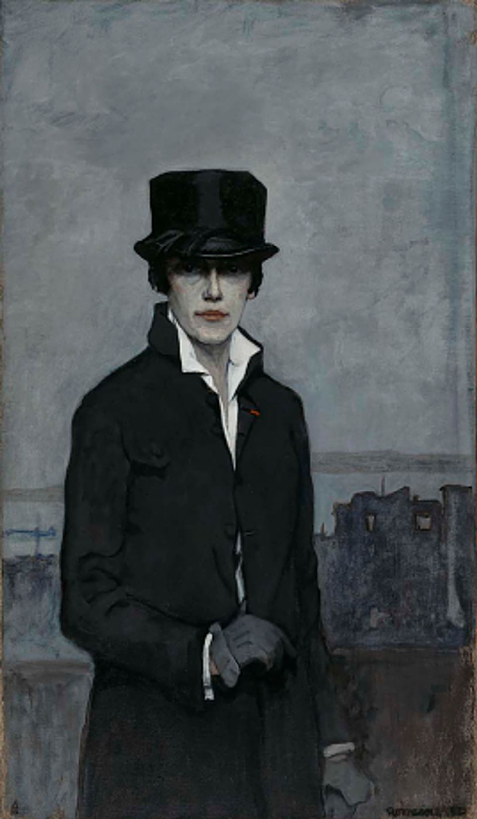 A photograph of a man in a black suit and hat against a gray background, part of the exhibition "The Art of Romaine Brooks"