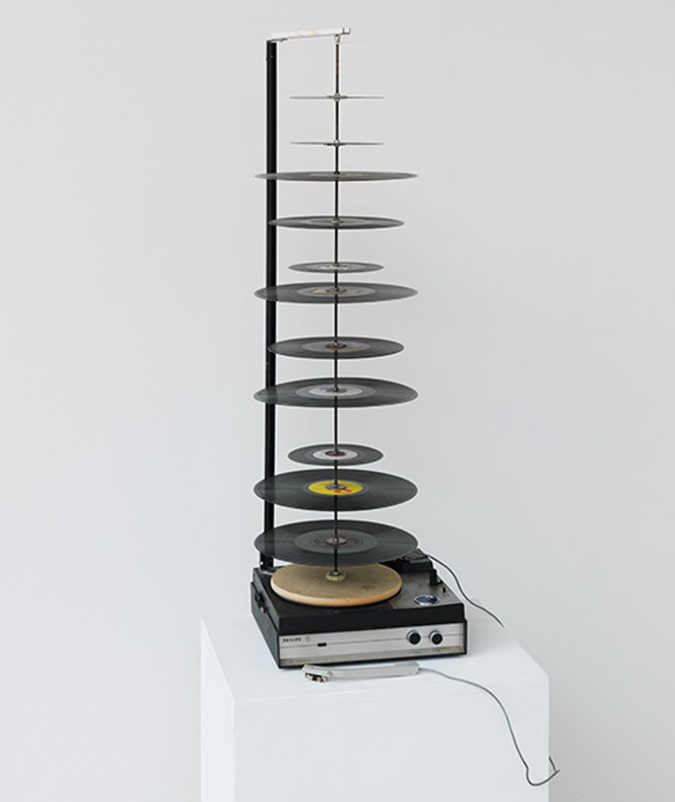 Name June Paik's Random Access made from record player with lengthened axis.