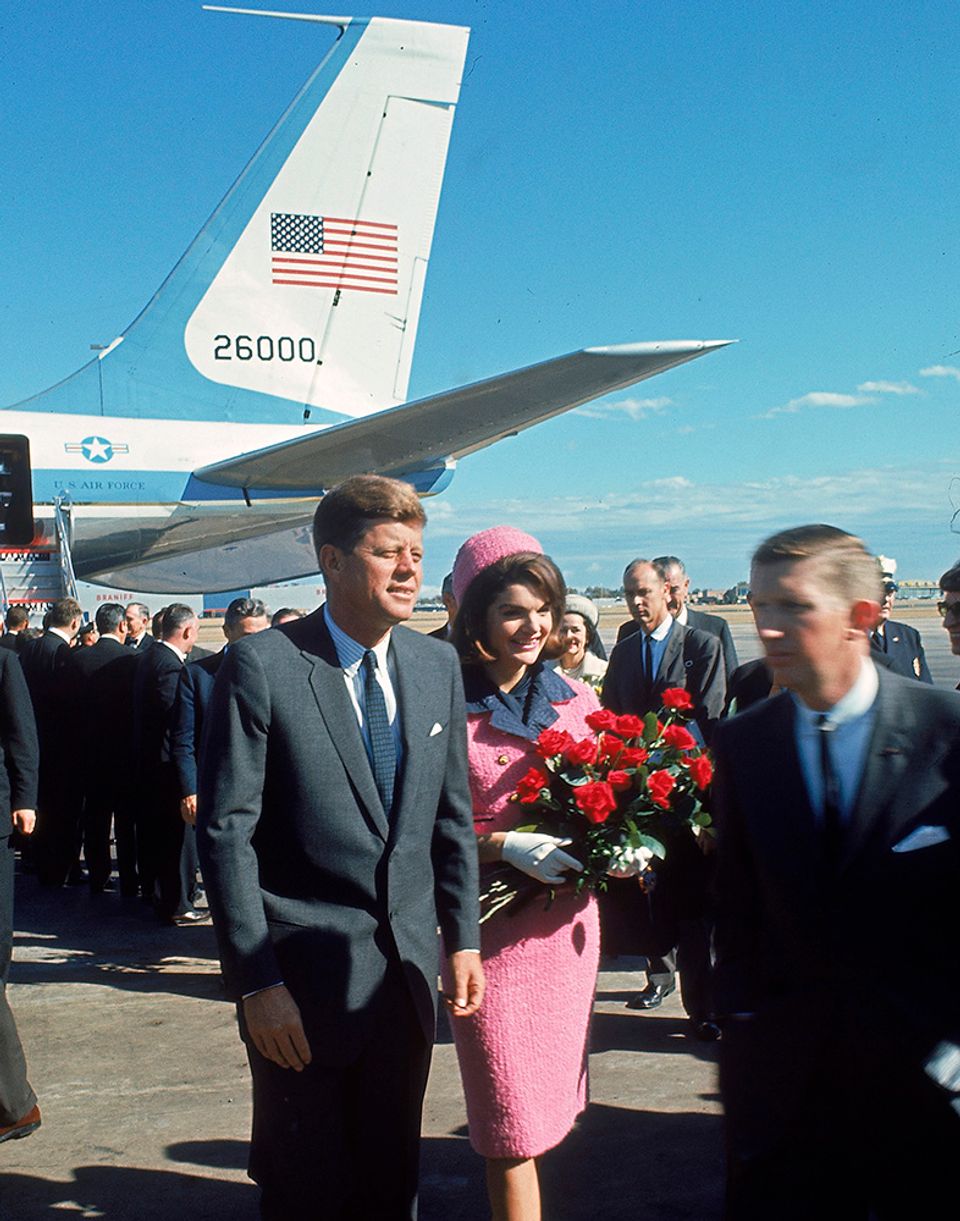 Jack and Jackie Kennedy walking on airline tarmac