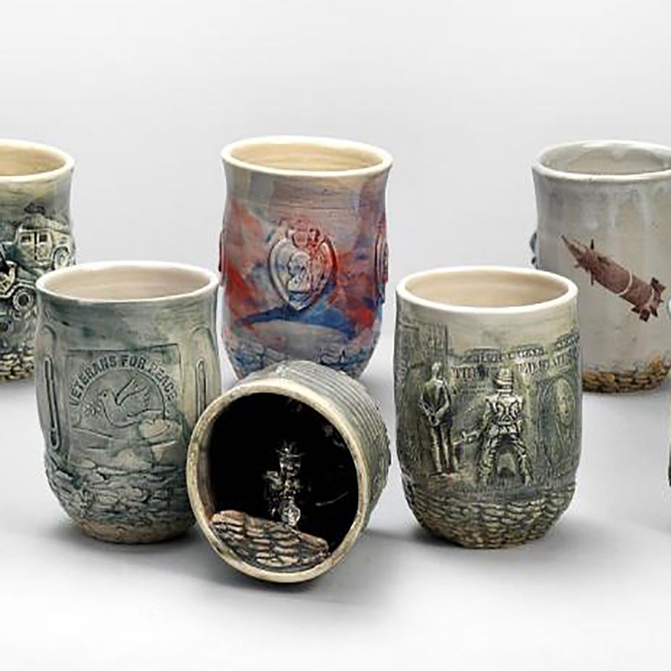 Ceramic mugs with stories on them. 