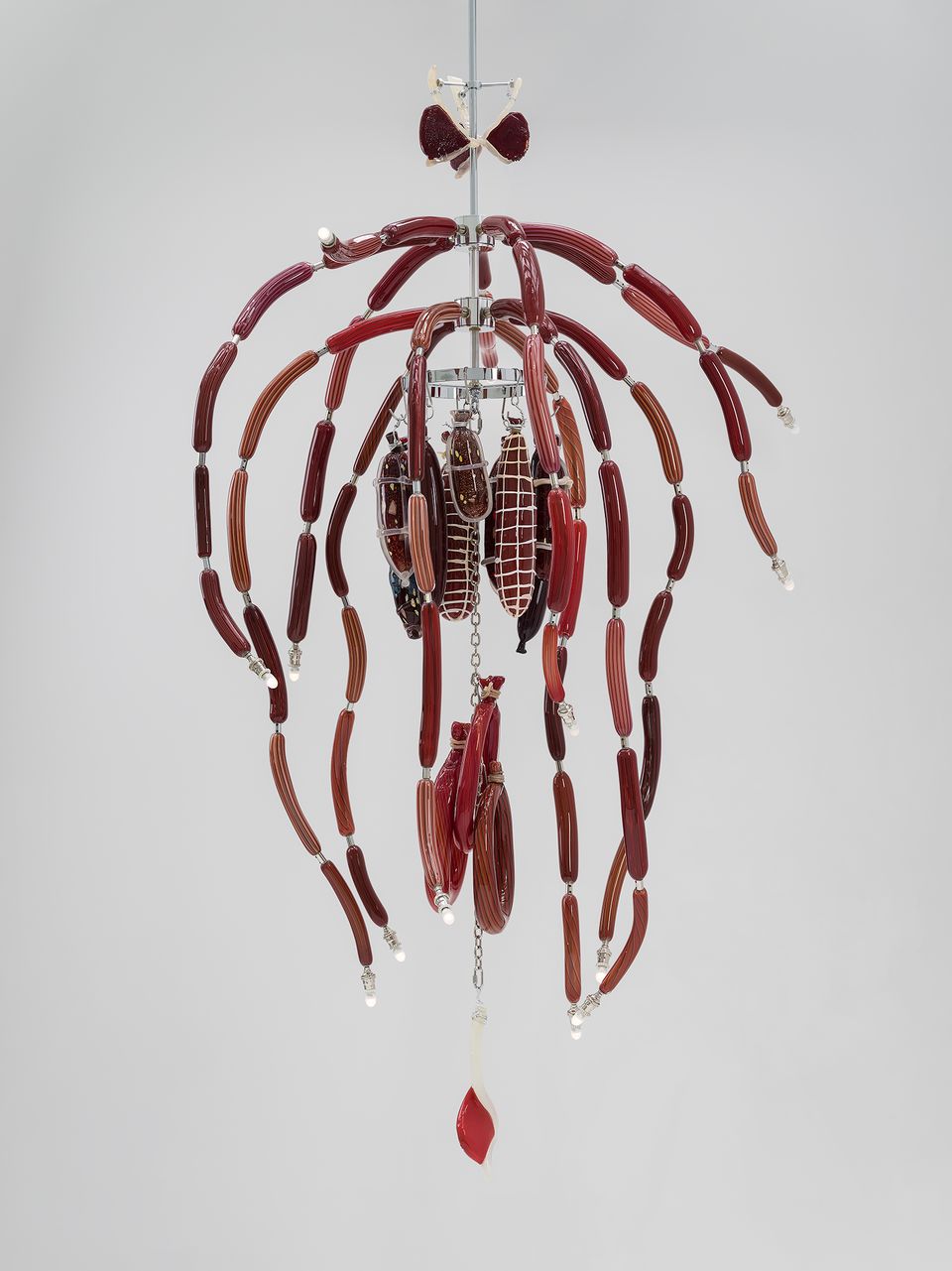 An artwork made of glass that looks like meat chandelier 