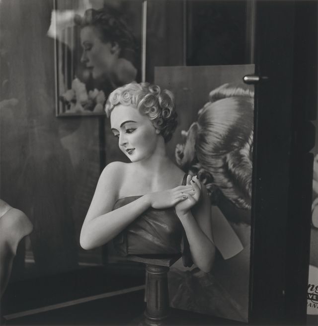 A photograph of a woman in a beauty shop.