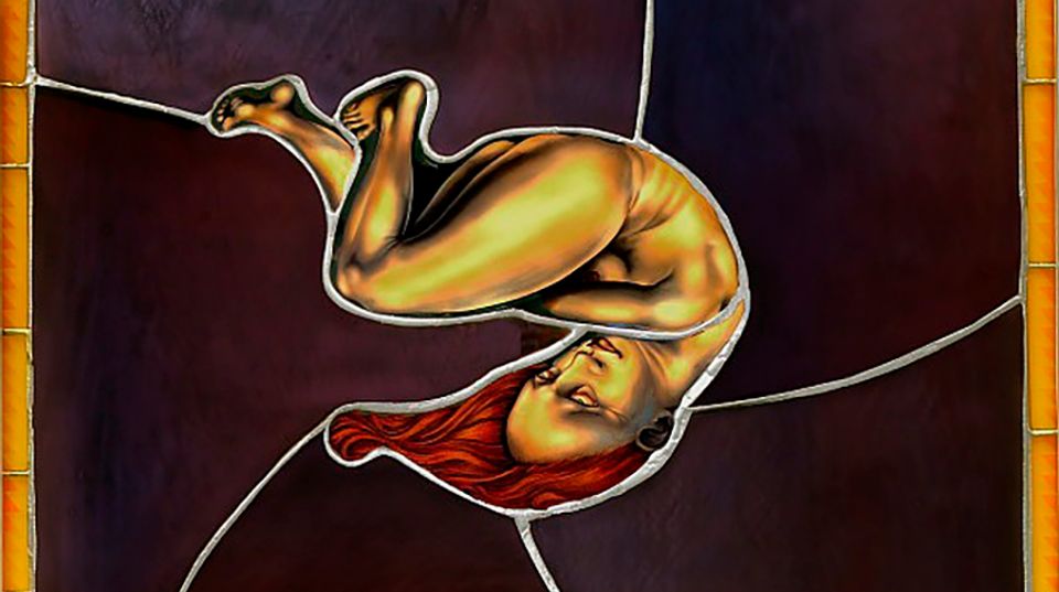 A detail of stained glass with a figure, in a fetal position, at the middle