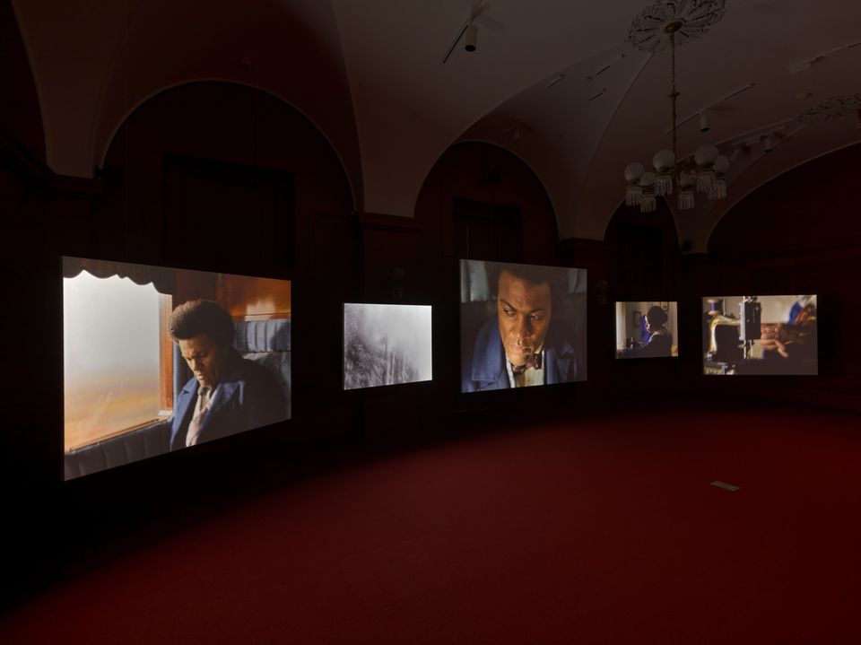 Five screen installation showing period reenactments of nineteenth-century activist Frederick Douglass.