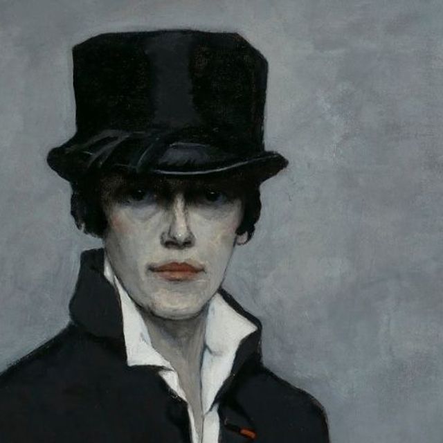 Head of Romaine Brooks wearing a hat, coat, and white shirt open at the collar.
