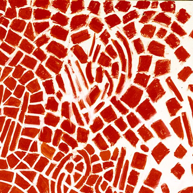 Detail of abstract painting showing red tiles of paint on a white background.