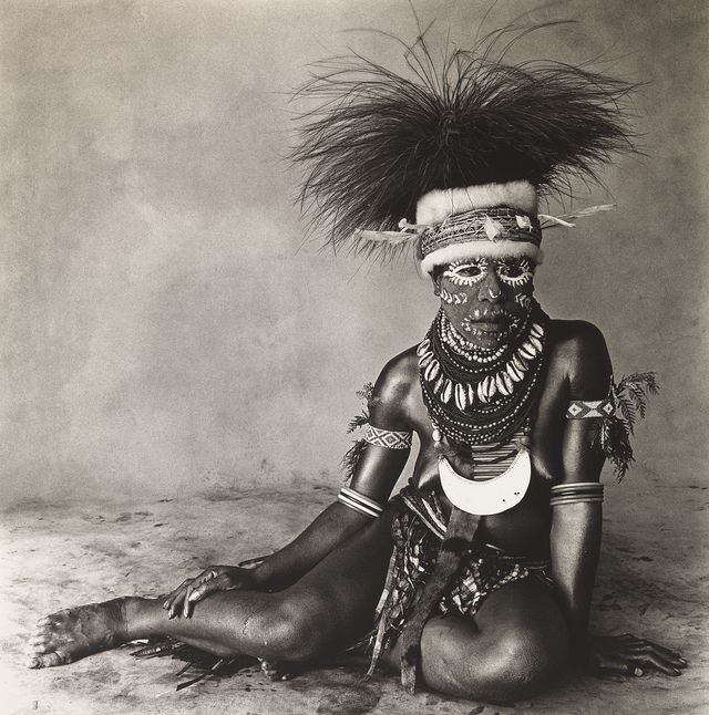 A photograph of an Enga Woman sitting down. 
