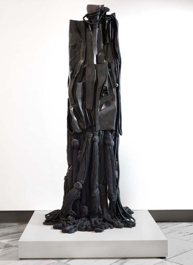 A large black steel sculpture. 