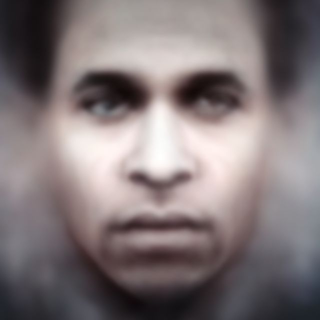 A photograph of a man's face.