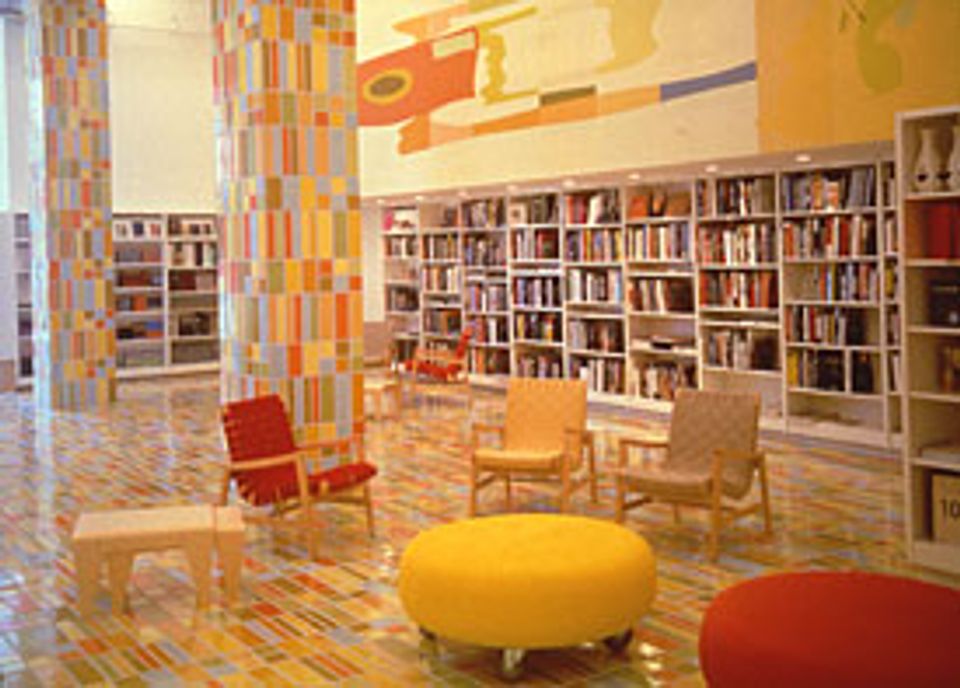 A photograph of a lobby, bookshop and gallery. 