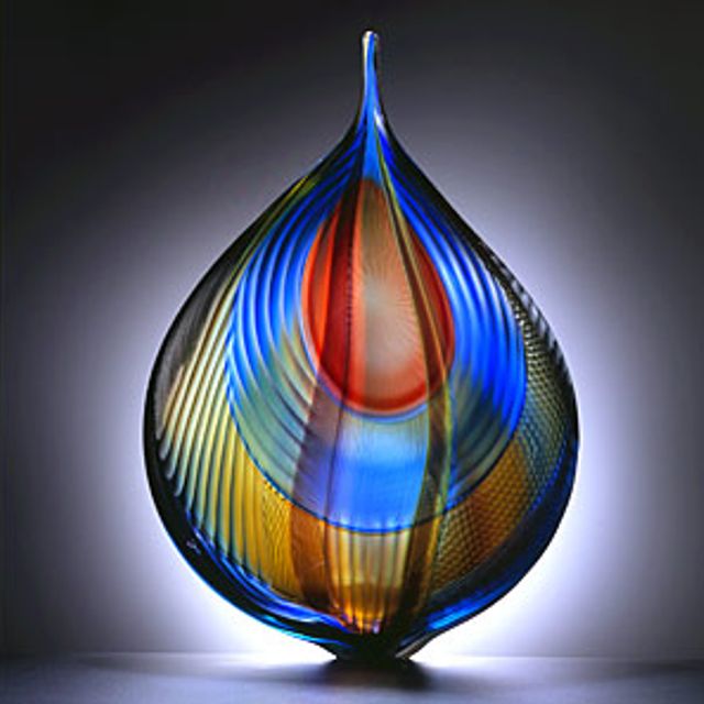 This is a blown glass structure with multiple incalmi crisscrossed canes. 