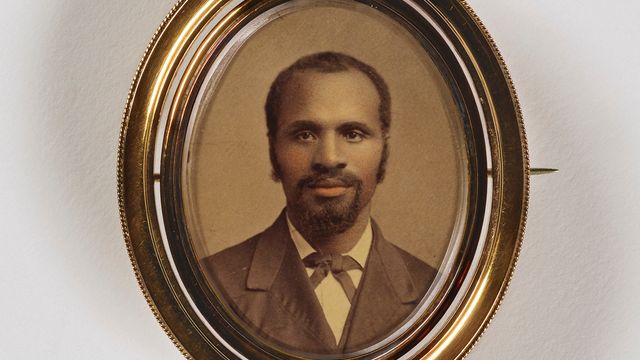 A portrait of a man with goatee contained in a brooch