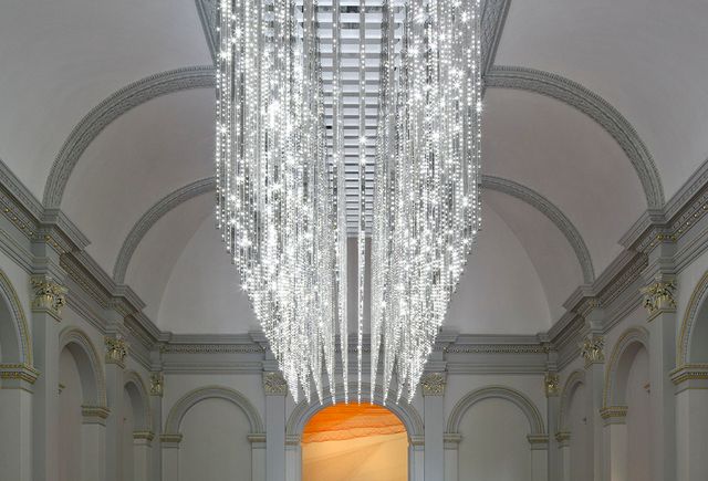 A photograph of an LED light pieces hanging from the ceiling. 
