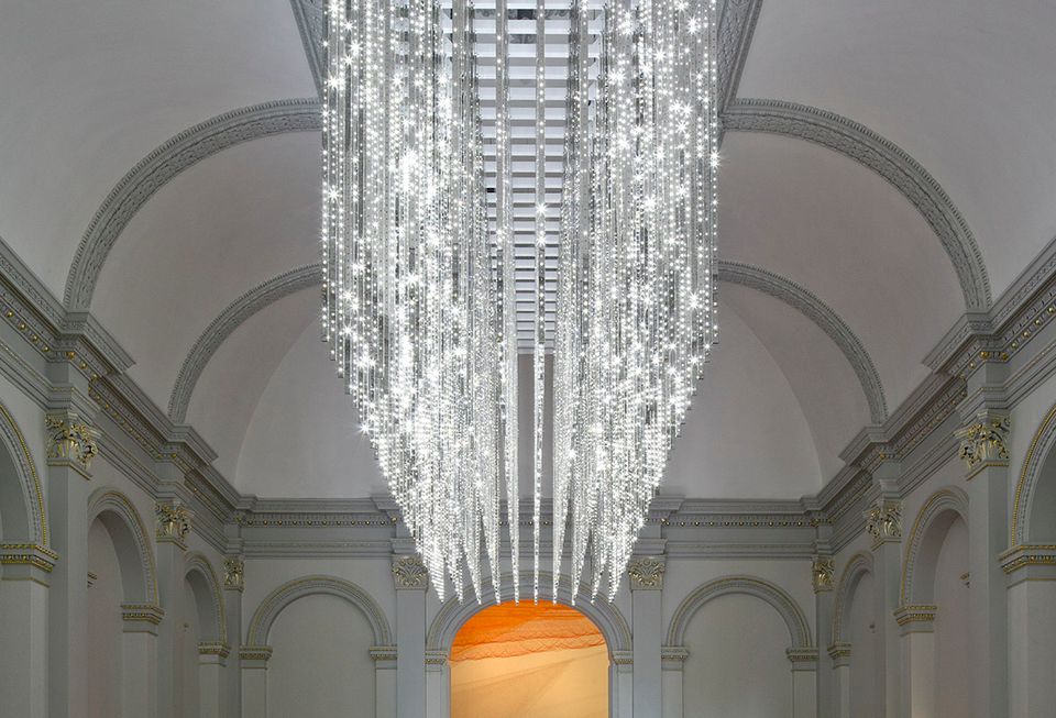 A photograph of an LED light pieces hanging from the ceiling. 