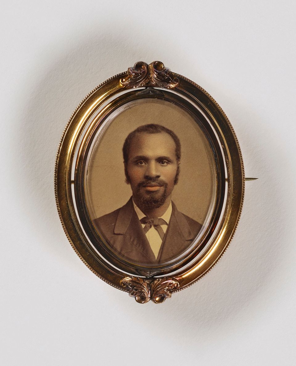 Portrait of man with a goatee wearing a suit