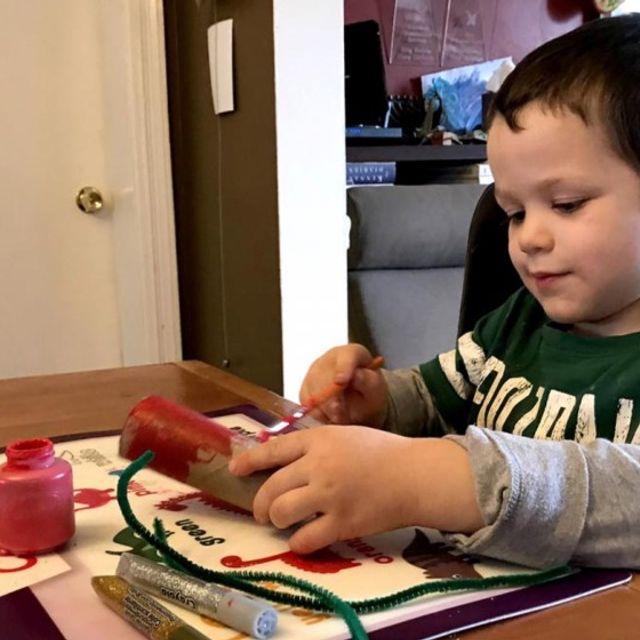 Image of a boy doing lunar new year crafts