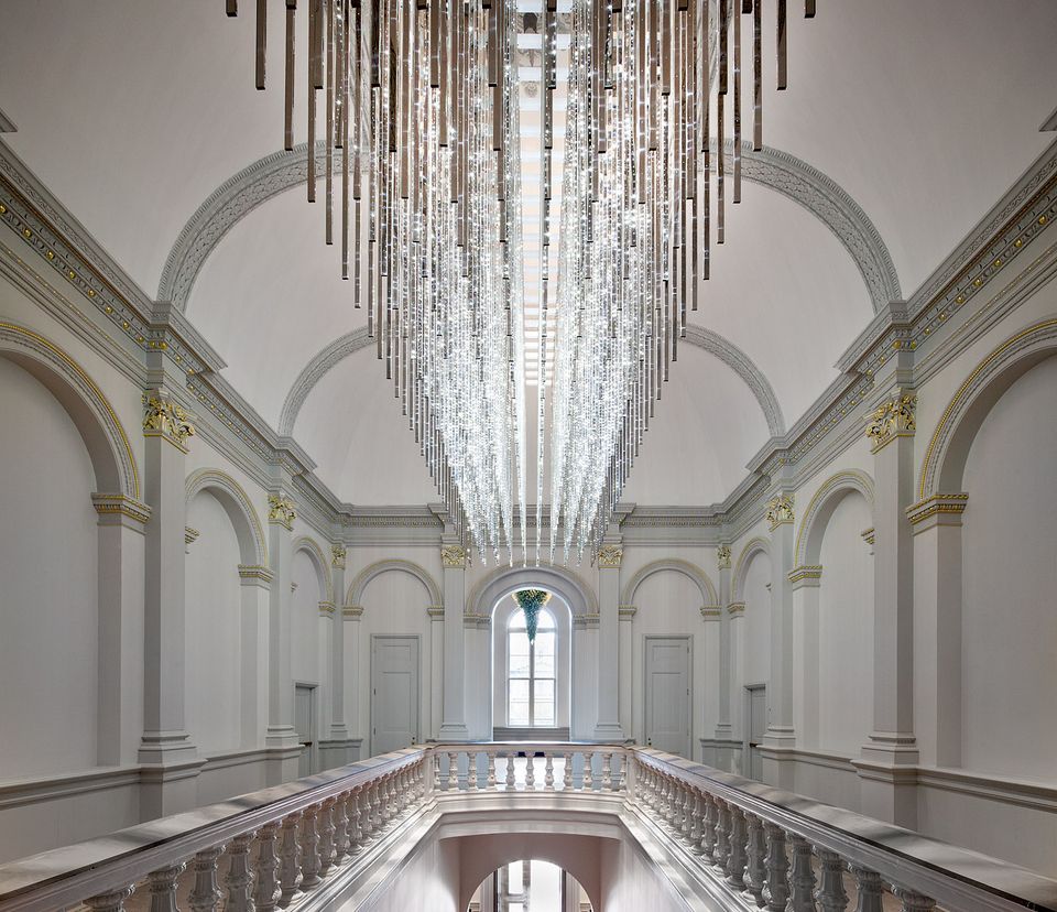 an image of the staircase with a grand LED chandelier at the Renwick Gallery.