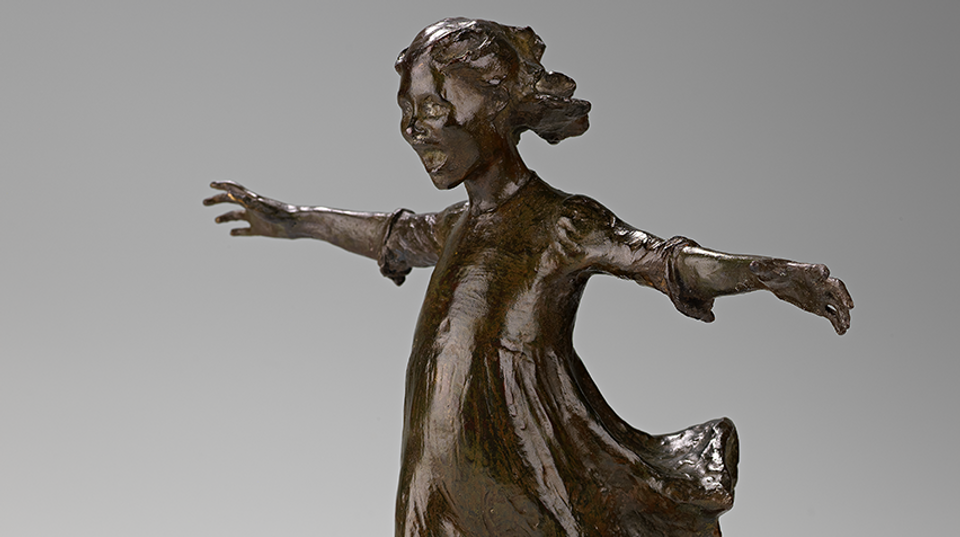 Detail of sculpture of a little girl
