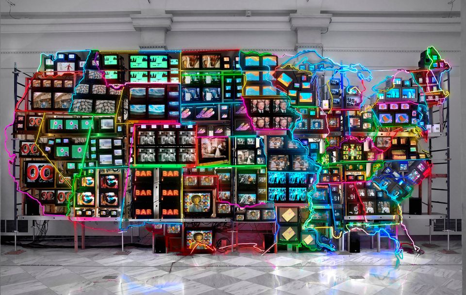 Multimedia installation of neon and video screens in the shape of the continental U.S.