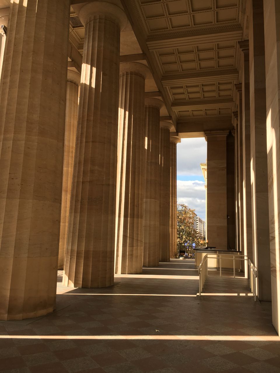 This is a photo inside the outdoor Portico at the Smithsonian American Art Museum.