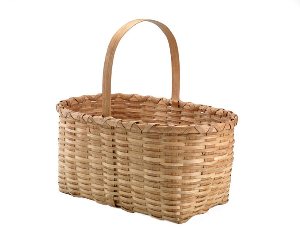 A basket that has a rectangular base with a handle.