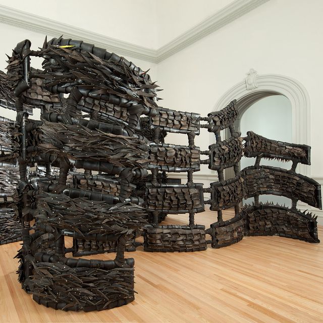 A gallery shot of Chakaia Booker's rubber sculpture.