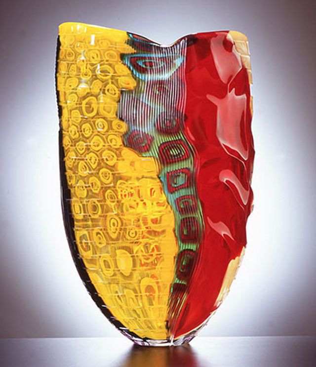 A yellow and red glass object.