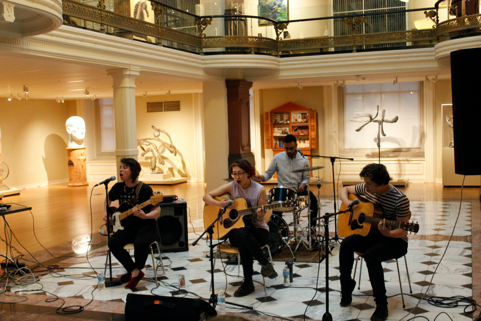 The four members of the rock band, Bad Moves, perform in the Luce Foundation Center.