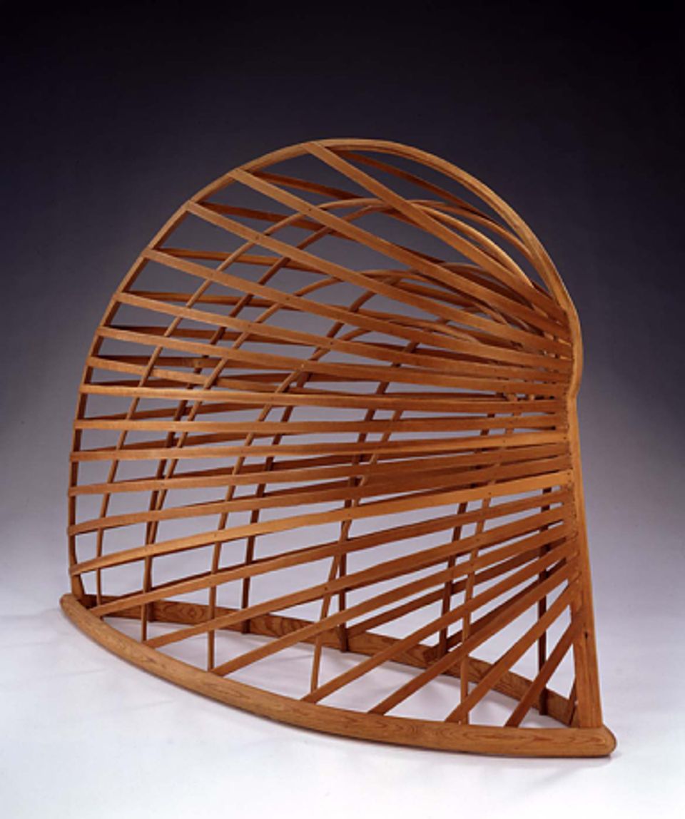 A photograph of a wooden structural artwork, part of the exhibition Martin Puryear: Multiple Dimensions