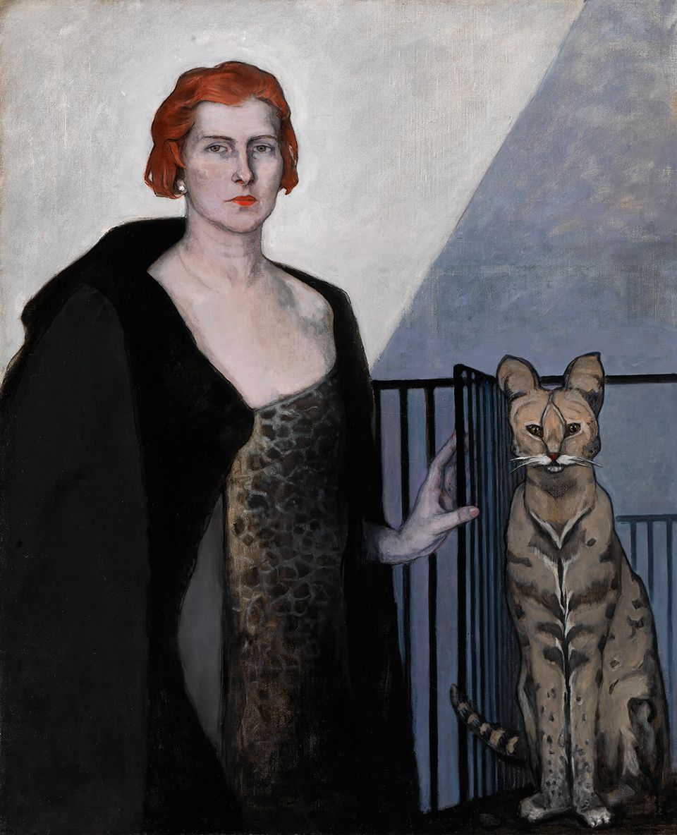 Romaine Brooks' La Baronne Emile D'Erlanger is a painting of a red headed woman with a cat. 