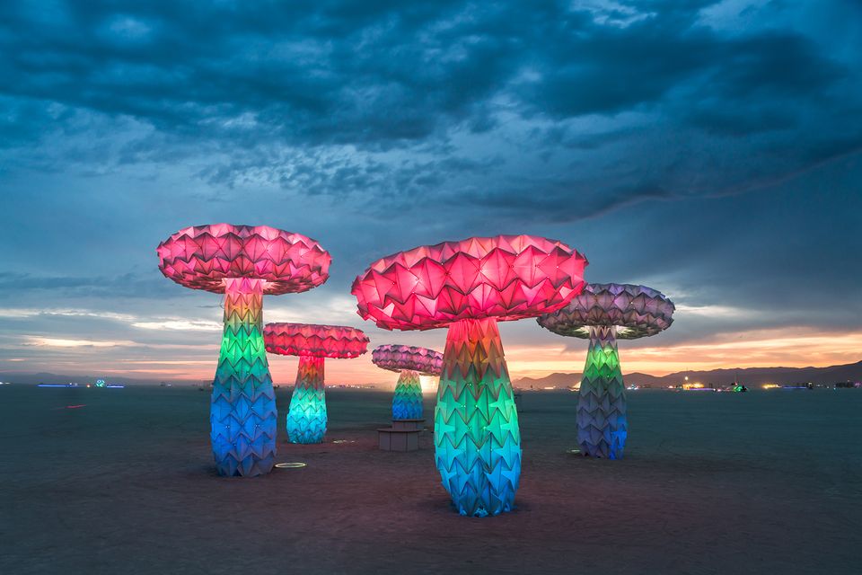 The sculpture piece, Shrumen Lumen, at Burning Man at night lit up. 