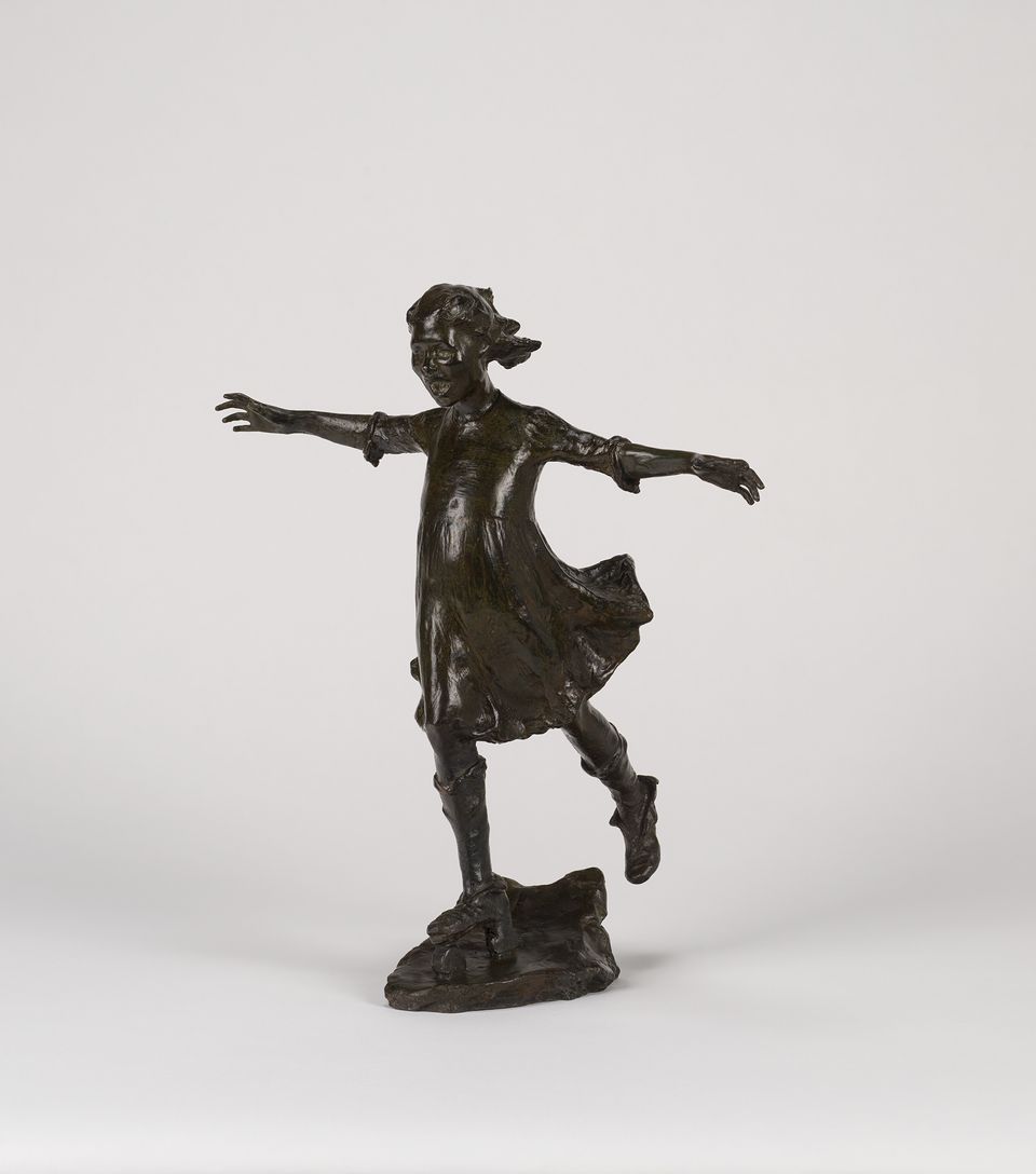 Bronze sculpture of a figure with arms extended, balancing on one foot in a roller skate, on a simple base, against a plain white background.