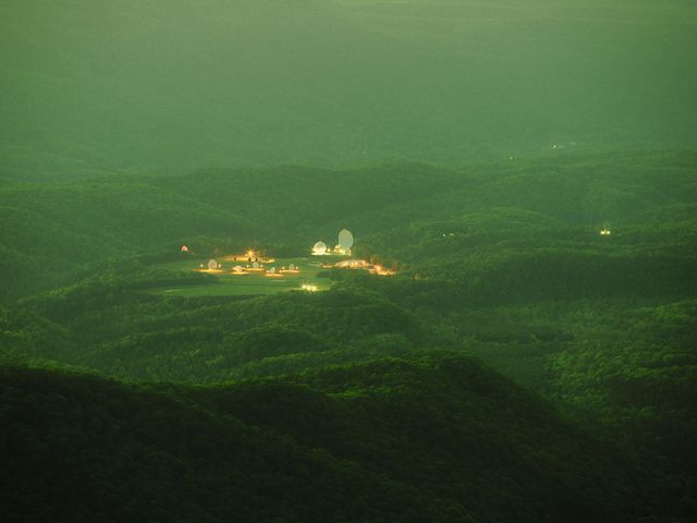 A photograph of a surveillance area at night.