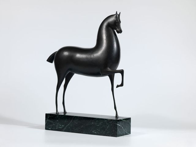 A bronze sculpture of a horse.