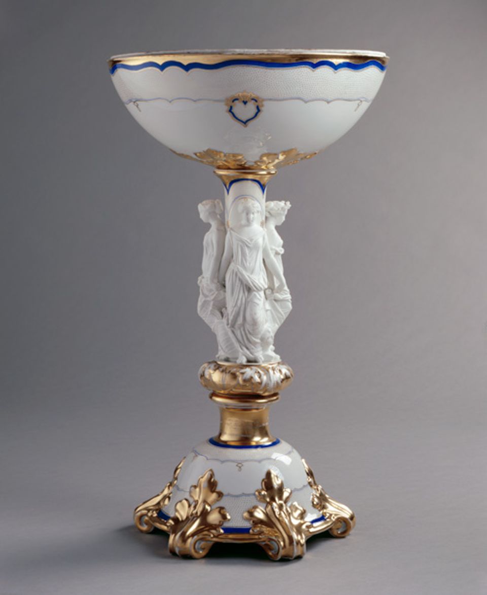 An image of a porcelain and parian ware centerpiece with gold decorations.