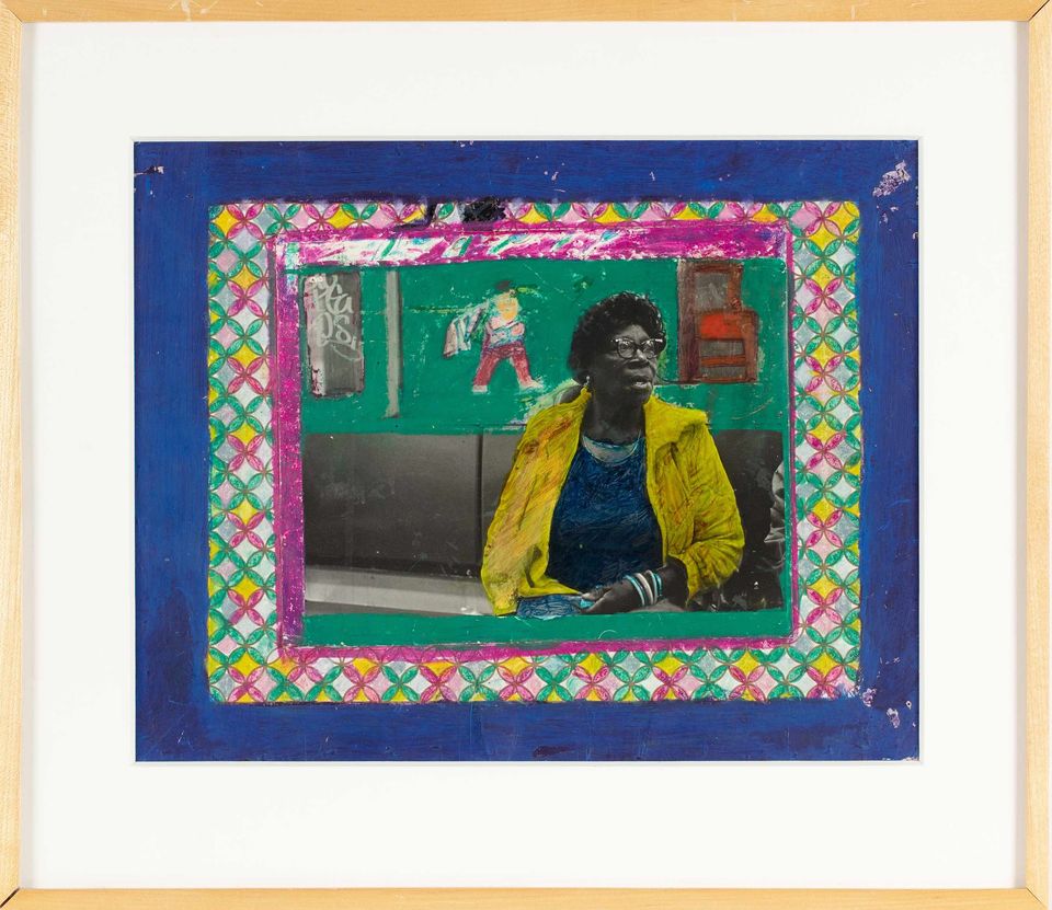 A mixed media piece shows a black woman in a yellow coat and blue top sitting in front of a green background. A colorful patterned frame surrounds her.