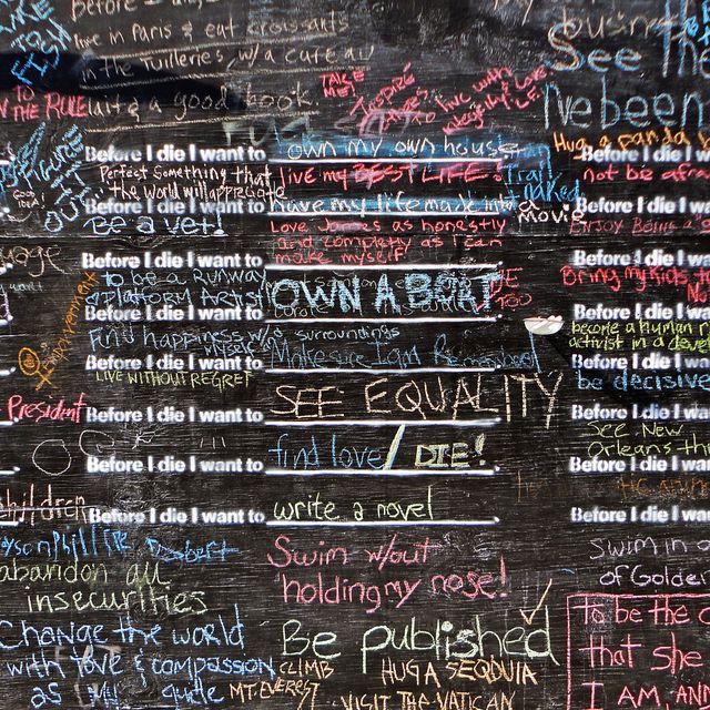 An image of a chalkboard and writing on it. 