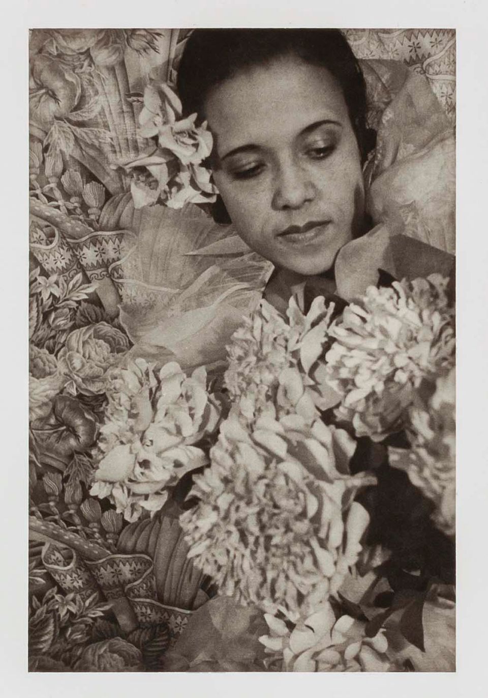 A black and white photograph of a woman looking down, part of the exhibition Harlem Heroes: Photographs by Carl Van Vechten 